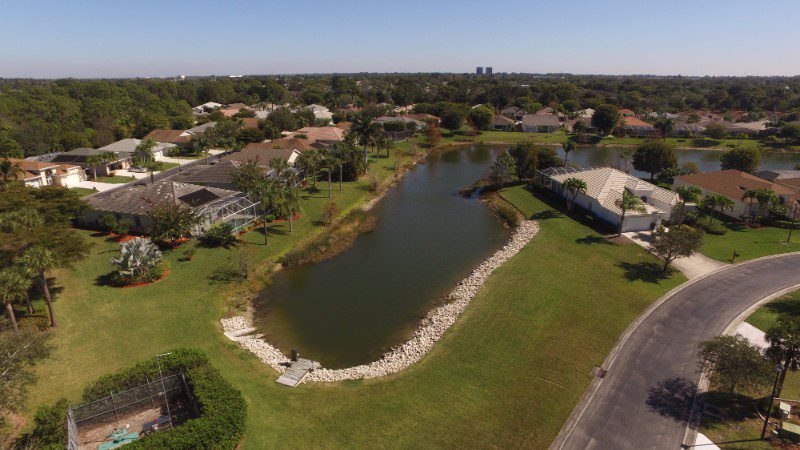 Top view of a lake along with houses