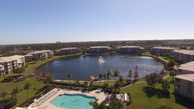 Aerial view of a lake and resort.