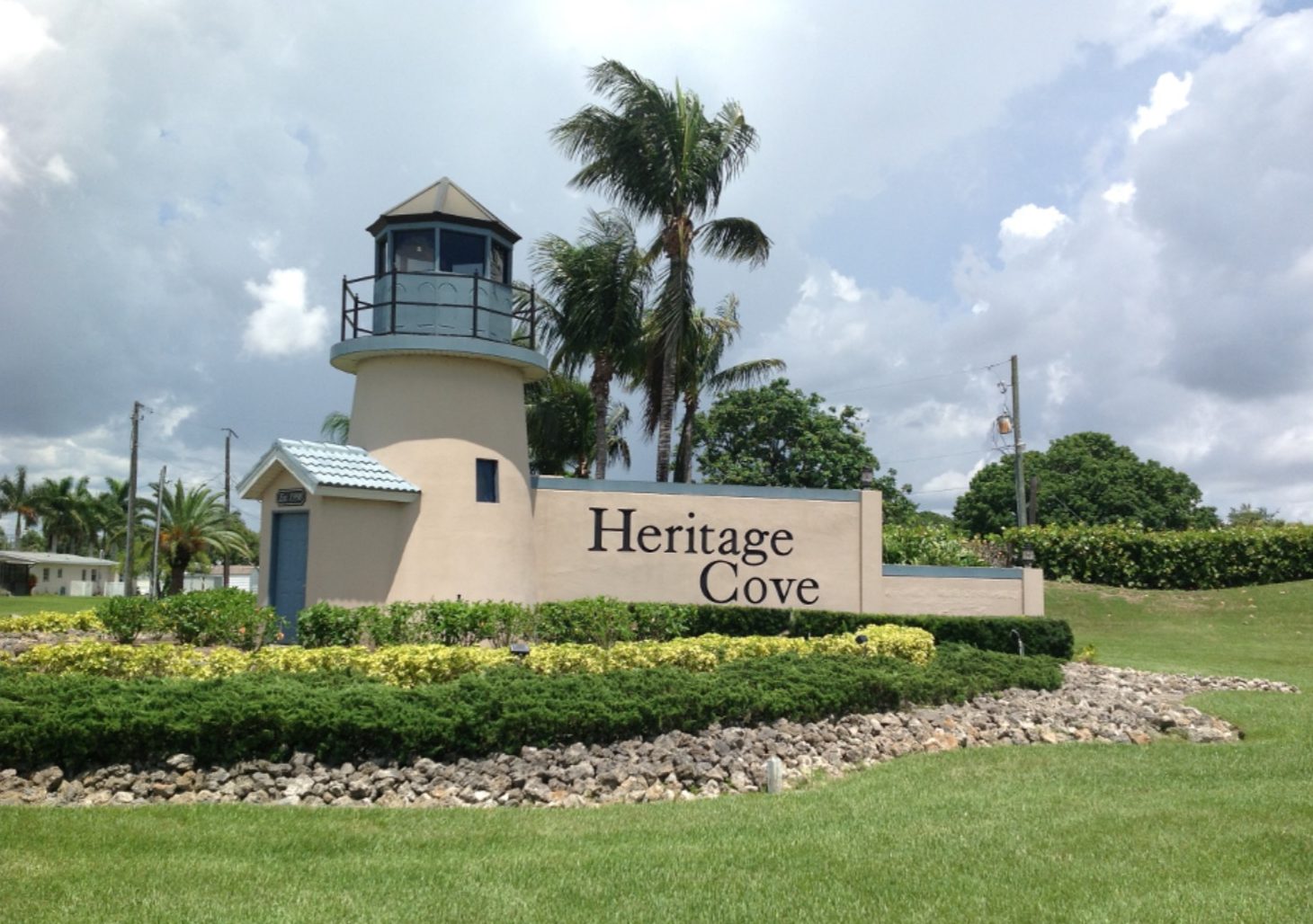 Heritage Cove community sign with lighthouse.